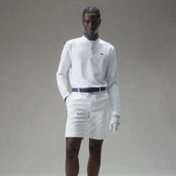 J.Lindeberg Tyson Long Sleeve Golf Polo Shirt -Golf Sale Store J.Lindeberg Tyson LS Reg Fit Polo GMJT07801 0000 SHLIN154 WhiteNavy Peony Model 1